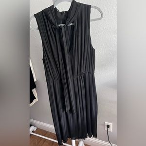 St. John sleeveless pleated knit dress - black with keyhole tie neckline